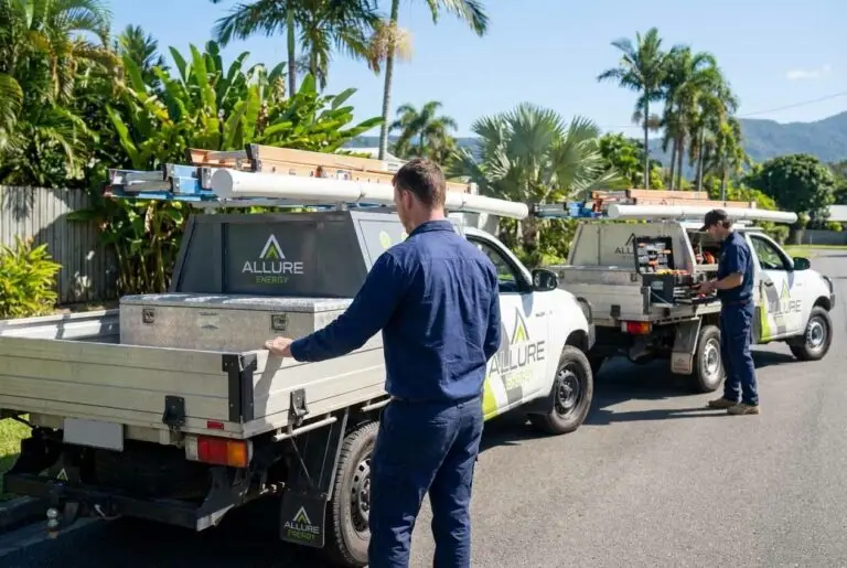 Electricians near me in Cairns preparing equipment beside Allure Energy electrical work utes