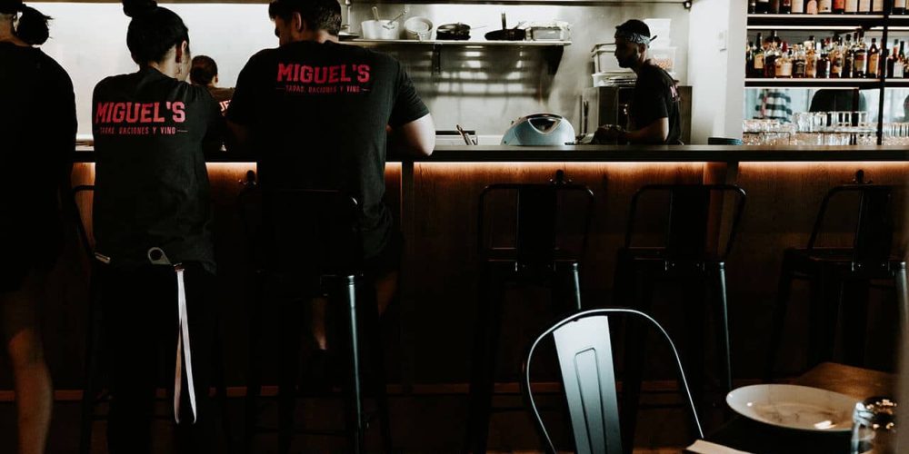Sleek bar lighting installed by Cairns commercial electricians at a Palm Cove restaurant.
