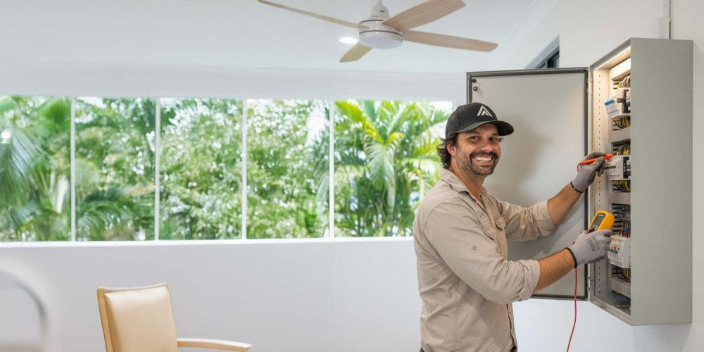 Licensed electrician performing an electrical safety inspection in Cairns for a residential property – Allure Energy